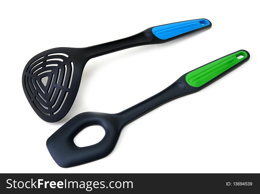 Plastic spoon and blade insulated on white background. Plastic spoon and blade insulated on white background