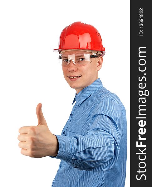 Young construction worker with thumbs up