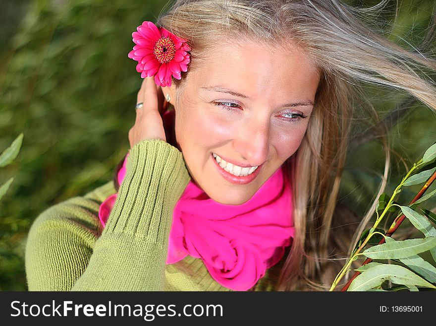 Caucasian blond woman with gerber flowers. Caucasian blond woman with gerber flowers