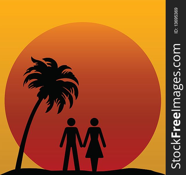 Couple silhouetted against a tropical sunset or sunrise