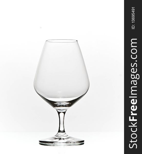 Isolated cognac brandy glass on white