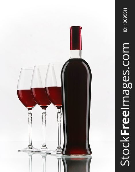 Red Wine Glasses And Bottle