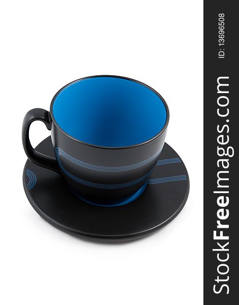 Big black and blue empty mug with saucer