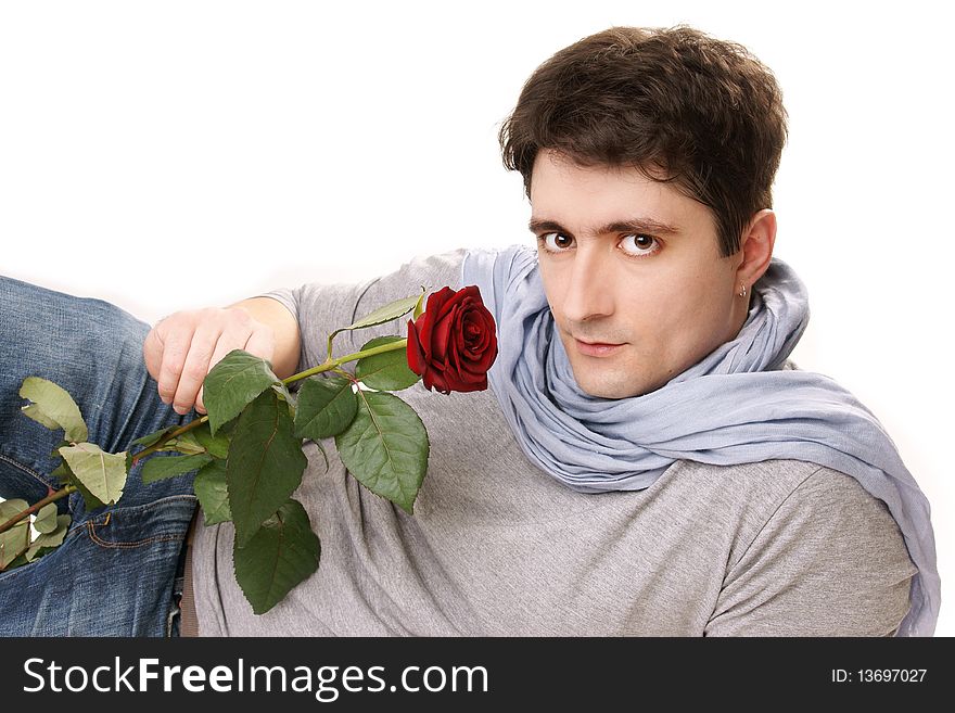 Young attractive smiling man with red rose on white background. Young attractive smiling man with red rose on white background