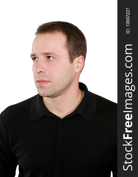 Portrait of the young man in a dark jumper, it is isolated on a white background.