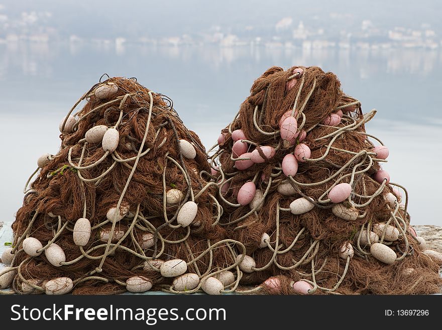 Two piles of fishing nets with floats. Two piles of fishing nets with floats