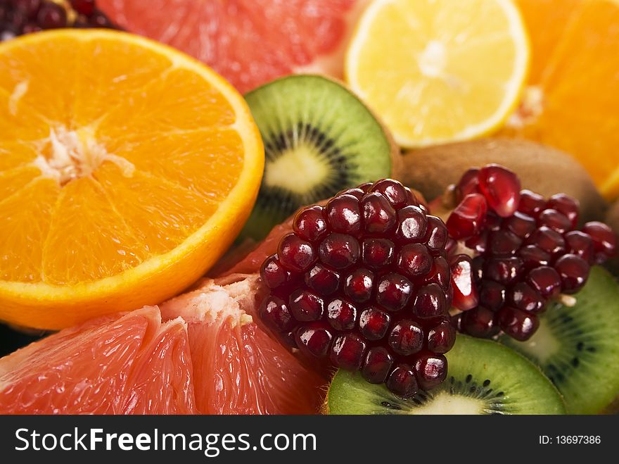 Set of different fresh fruits. Colorful background.