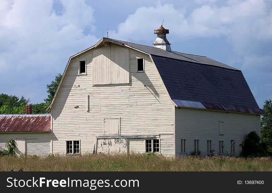 Large Old Barn In A Field