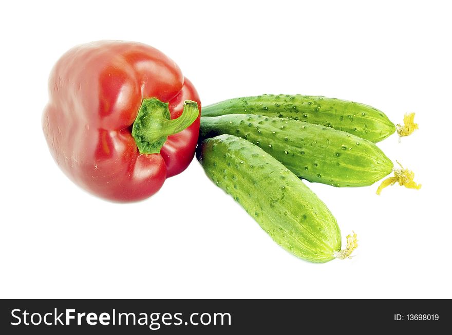Bulgarian pepper and cucumber on a white background