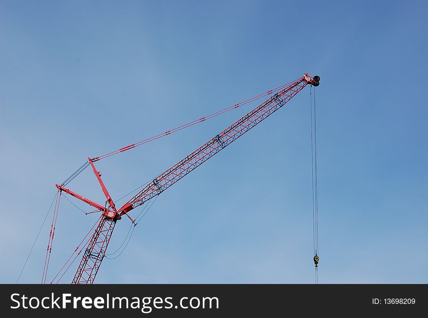 Red construction crane in the morning. Red construction crane in the morning