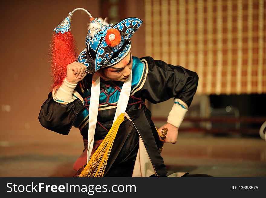 China opera actor with hat