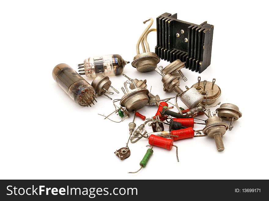 Old radio components on white background