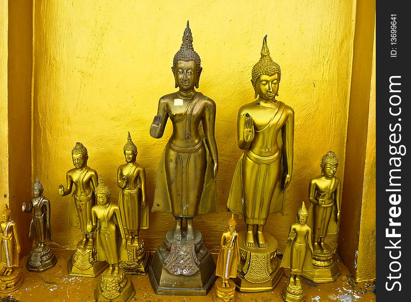 Golden Standing buddha in Thailand