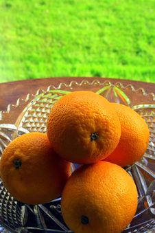 Four Oranges In A Crystal Bowl Royalty Free Stock Photography Four Oranges In A Crystal Bowl Royalty Free Stock Photography