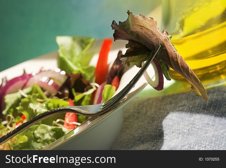 Garden salad on plate with olive oil. Garden salad on plate with olive oil