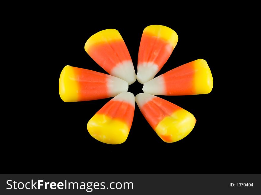 Halloween candy corn arranged in a circle. Halloween candy corn arranged in a circle