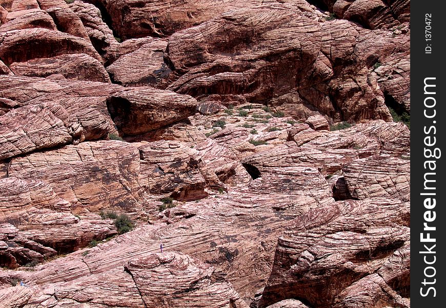 A Close-up View Of A Red Mountain At Red Rock Canyon Near Las Vegas Nevada. A Close-up View Of A Red Mountain At Red Rock Canyon Near Las Vegas Nevada