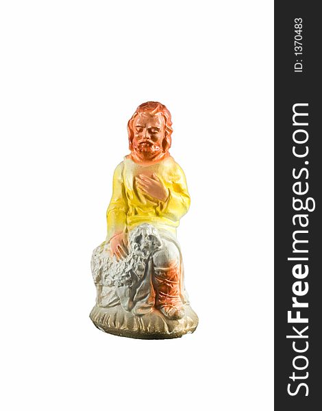 Yellow shepherd figurine from a nativity set. Yellow shepherd figurine from a nativity set