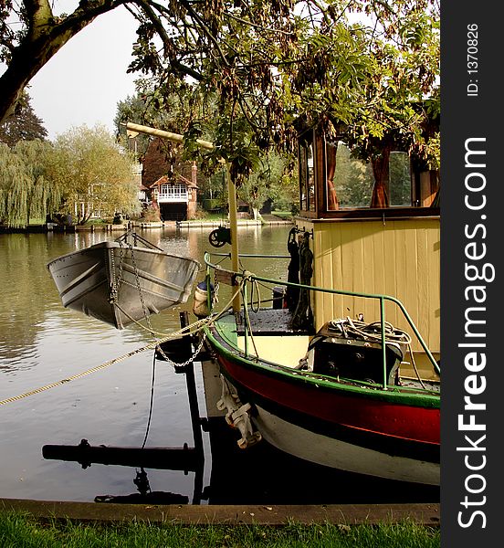 Stern of a moored Boat on a Tranquil English River. Stern of a moored Boat on a Tranquil English River