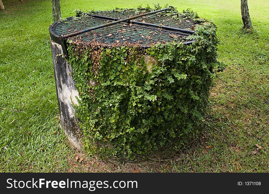 Abandoned well in a park. Abandoned well in a park.