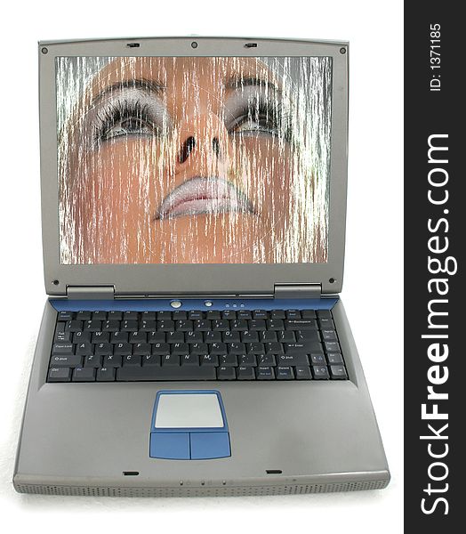 Woman's face in laptop over white. Woman's face in laptop over white.