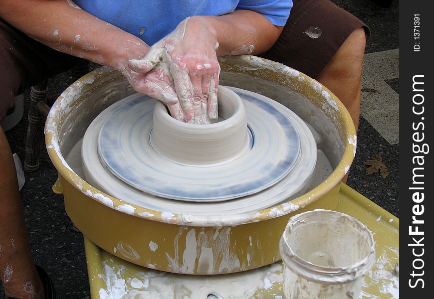 A Close-up Of A Potter Making A Bowl. A Close-up Of A Potter Making A Bowl