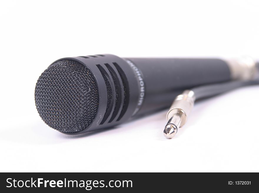 Picture of a microphone with a connection jack. Picture of a microphone with a connection jack