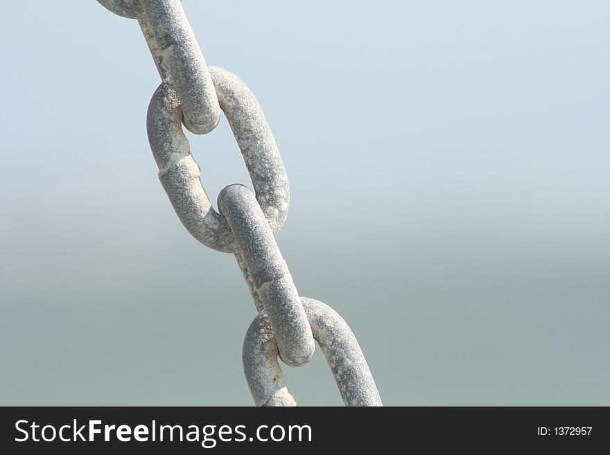 Gray chain in blue background. Gray chain in blue background