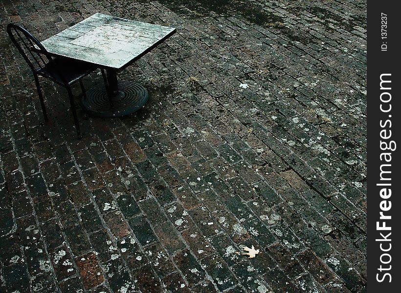 Outdoor table in a brick floor