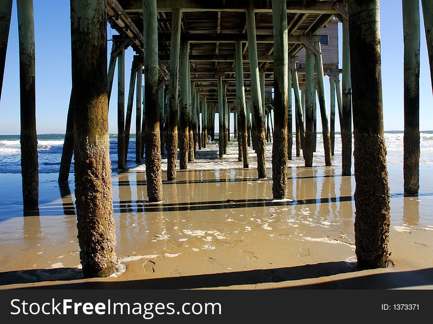 Looking under the pier at Old Orchard beach in Maine.