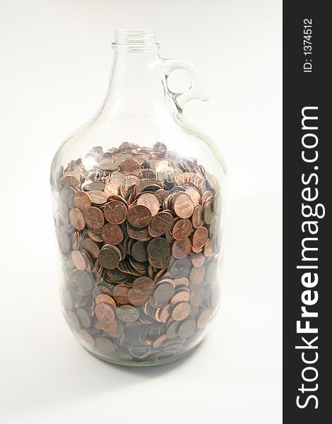 Gallon of pennies in a glass jar