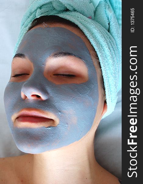 Woman rest in blue mask. Woman rest in blue mask