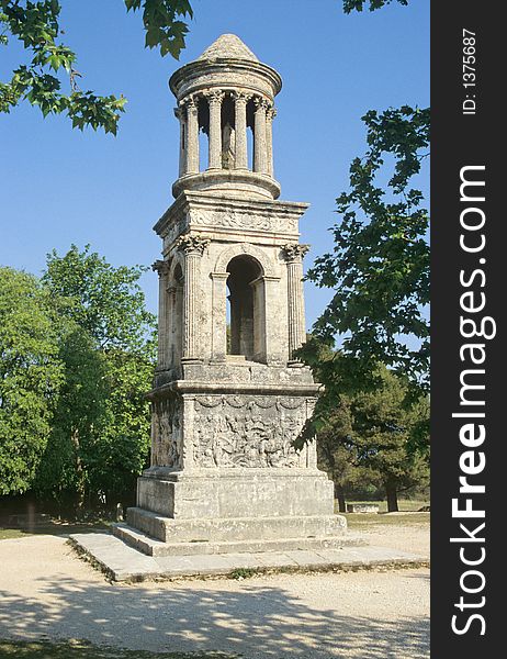 Ancient roman mausoleum in anancient city of Glanum, near Saint Remy de Provence, south of France. Ancient roman mausoleum in anancient city of Glanum, near Saint Remy de Provence, south of France.