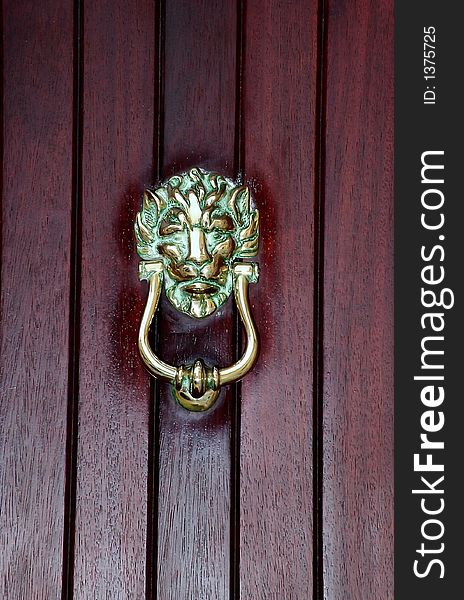 Detail of lion-shaped bronze, medieval, door knocker in Mdina Malta. Detail of lion-shaped bronze, medieval, door knocker in Mdina Malta