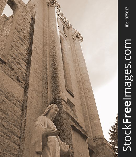 A statue of the Virgin Mary standing outside the ruins of the  historic St. Boniface Cathedral in Winnipeg, Manitoba, Canada. A statue of the Virgin Mary standing outside the ruins of the  historic St. Boniface Cathedral in Winnipeg, Manitoba, Canada