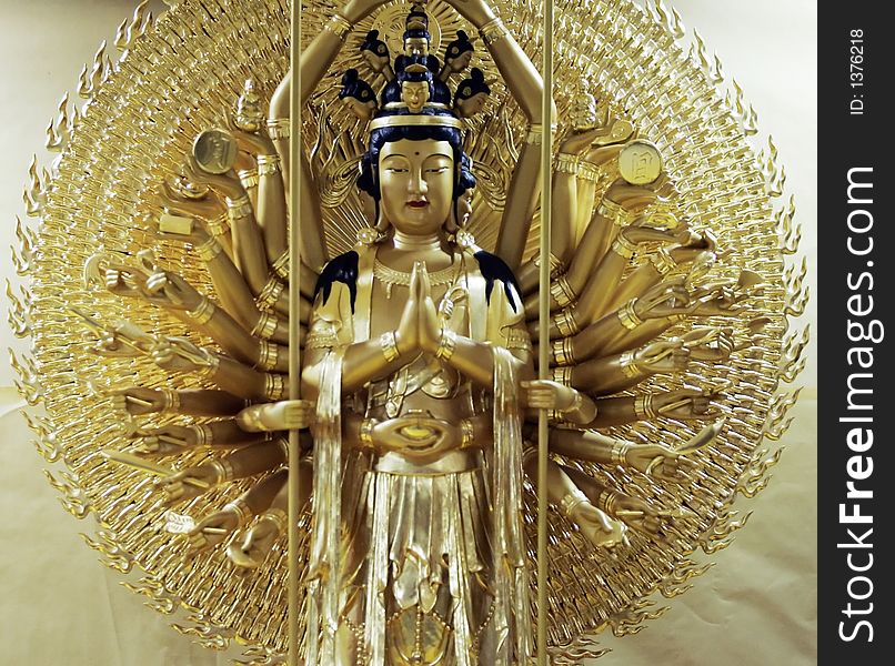 A Goddess Buddha statue on display at a temple.