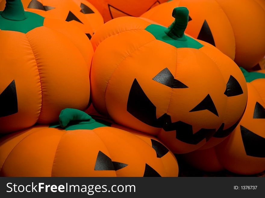 This is a photo of halloween pumpkin faced cushions. This is a photo of halloween pumpkin faced cushions.