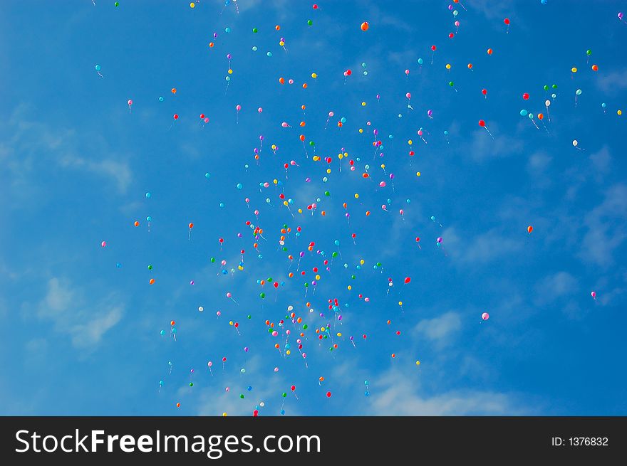 Colorful balloons high in the sky