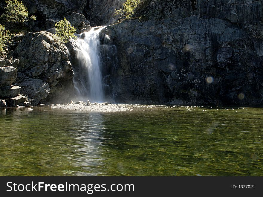 Picture of waterfall from permafrost above Lysefjord in Norway.