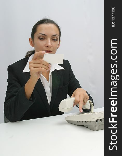 Business woman is prinring in office, copy, duplicate, calling