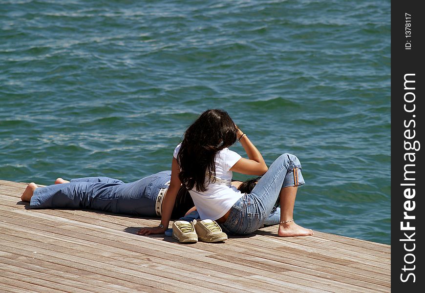 Couple resting close to the sea