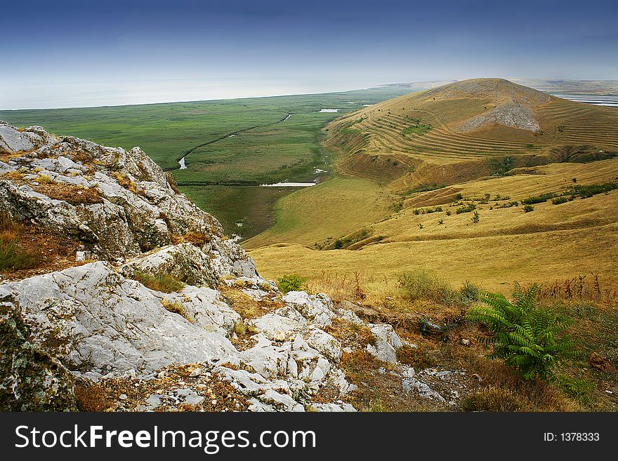 Danube delta rocky landscape with blue sky