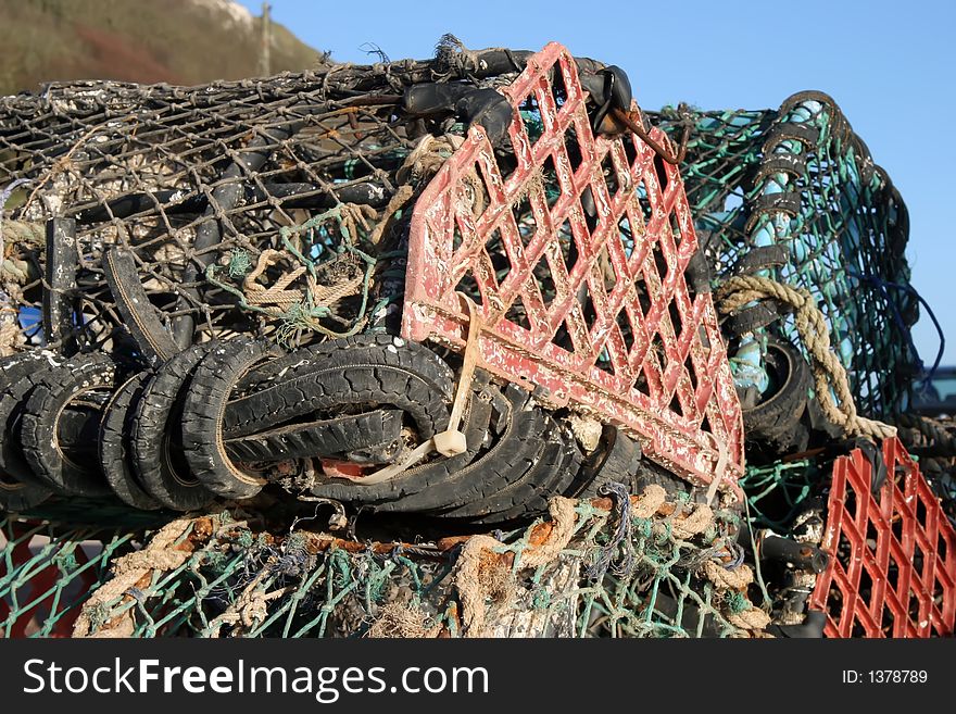 Lobster pots on the dockside at Seaton, Devon.