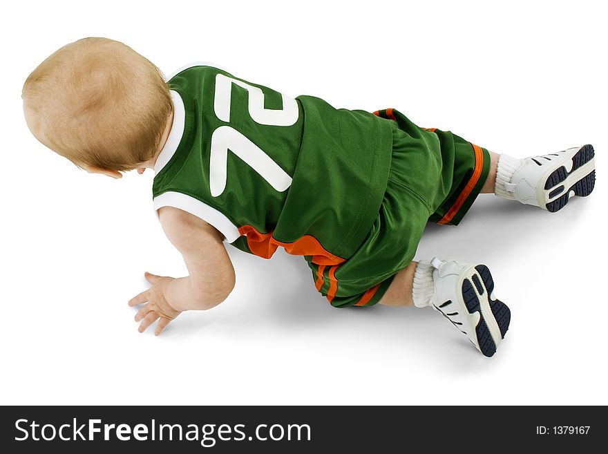 Top side of baby boy crawling.  Clipping path. Over white. Top side of baby boy crawling.  Clipping path. Over white.