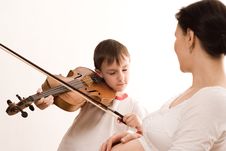 Woman And The Son Of A Violin Stock Photos