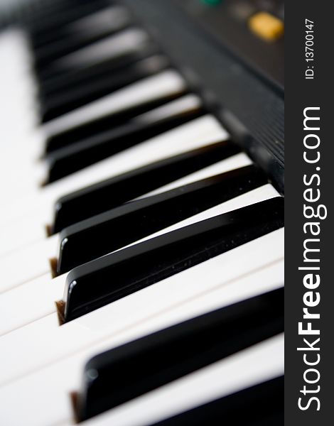 Black and white keys on an electric piano. Black and white keys on an electric piano.