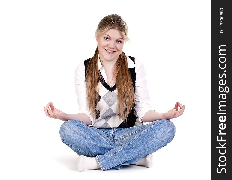 Pretty relaxed woman practicing yoga on a white background. Pretty relaxed woman practicing yoga on a white background