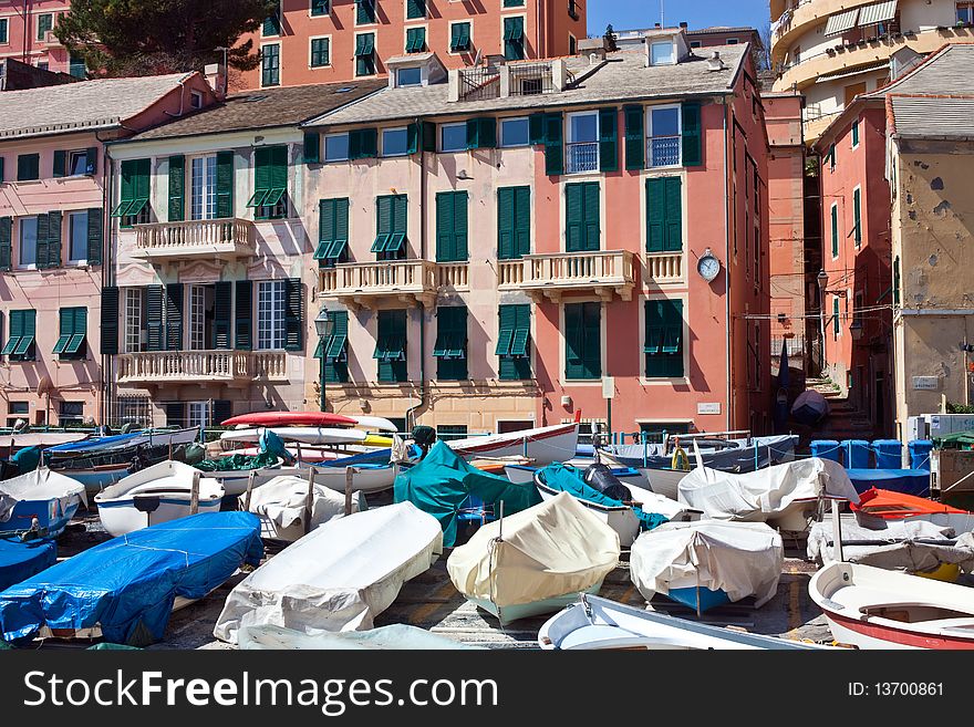 A typical ligurian village with houses and boats