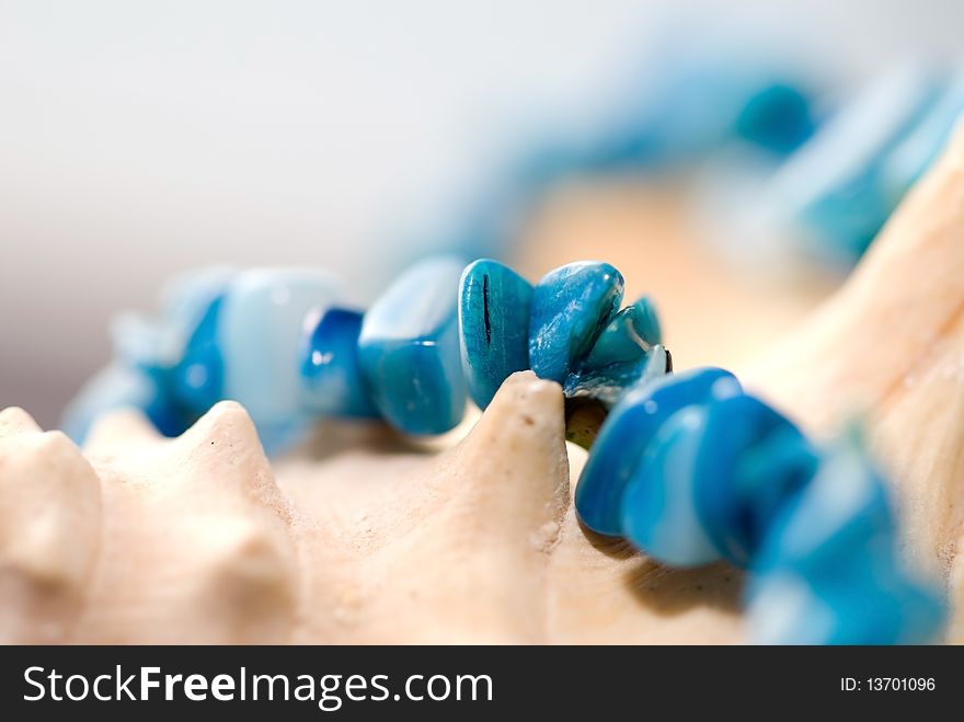 Blue necklace in macro mode. Blue necklace in macro mode.