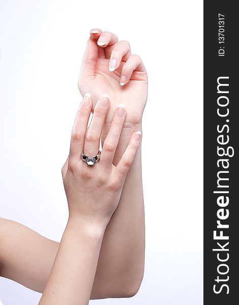 Photo of beautiful female hands with perfect manicure and shiny ring